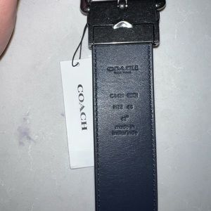 Men's Coach dark blue belt.